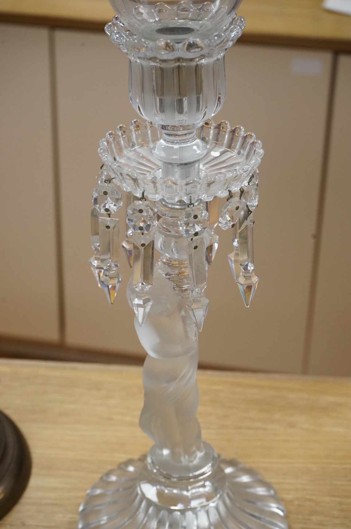 A Baccarat lustre drop figural glass candlestick, 62cm